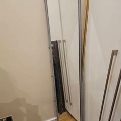 Freestanding metal mirror