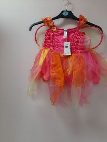 New fairy costume with wings and tag attached