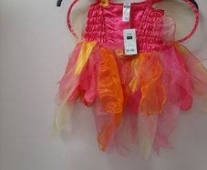 New fairy costume with wings and tag attached