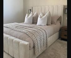 Upholstered King Ottoman Beds Collection