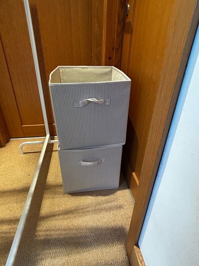 Clothing rail, hangers and storage boxes