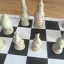Andux Alice in Wonderland Chess Set with Leatherette Board & Wooden Box Image 3