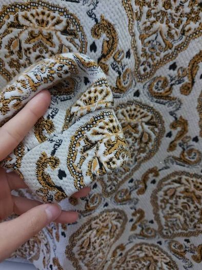 Gold and black design top