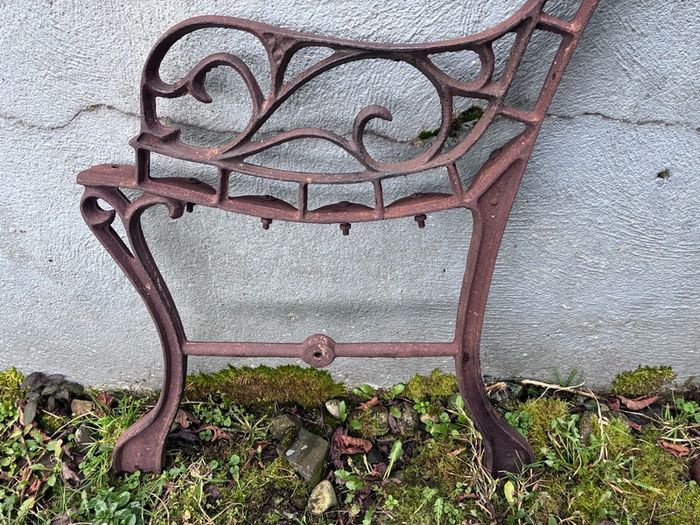 Pair cast iron children's bench ends