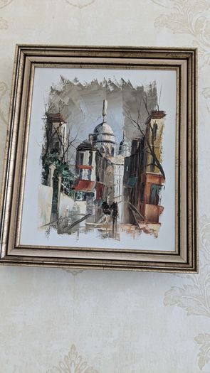 Pair of framed Parisian city scene prints