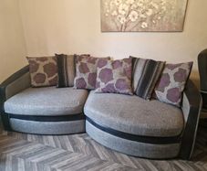 Large couch, swivel armchair and large footstool