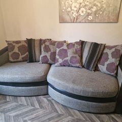 Large couch, swivel armchair and large footstool