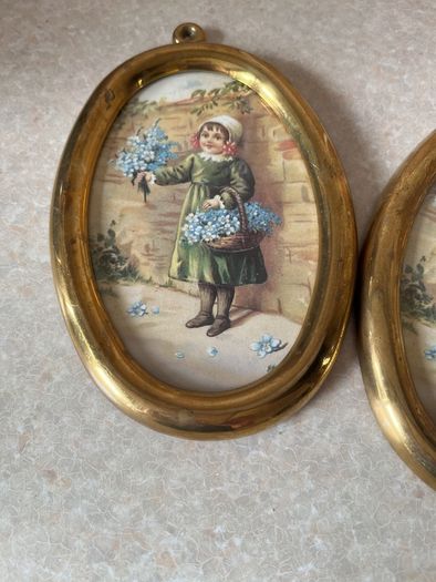 Vintage Pair Wall oval Brass frames features a young girl holding flowers