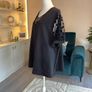 Ladies Black Short-sleeve Top Features Sheer polka-dot mesh sleeves Image 9