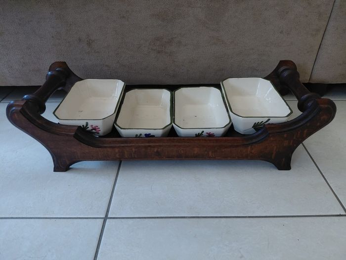 Vintage wooden serving tray with four ramekins