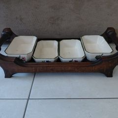 Vintage wooden serving tray with four ramekins