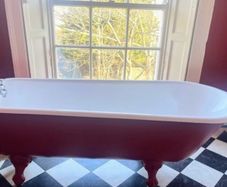 Cast iron bath with taps