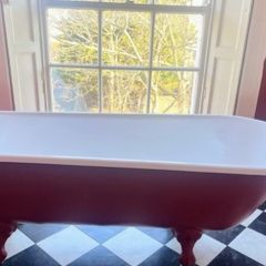 Cast iron bath with taps