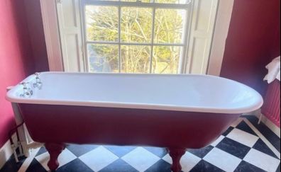 Cast iron bath with taps