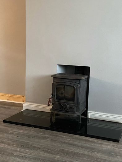 Stanley stove and black hearth