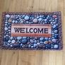 Mat with Welcome on it . Stones design on it. 76 x 50cm Image 2