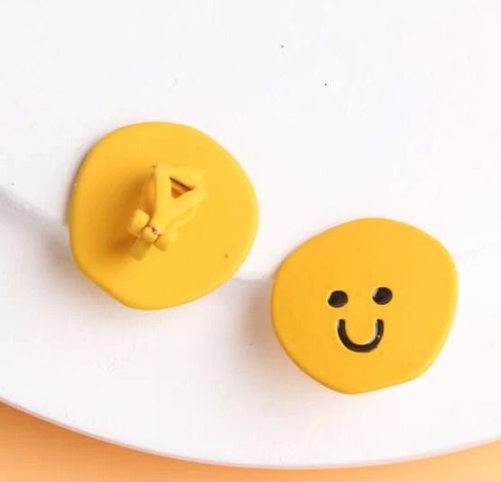 Yellow ear cuffs