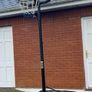 Portable Basketball Stand- Adjustable. stored in garage when not in use. In Very Good Condition. Image 5