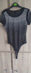Black mesh top bodysuit with rhinestones would fit Xs s m