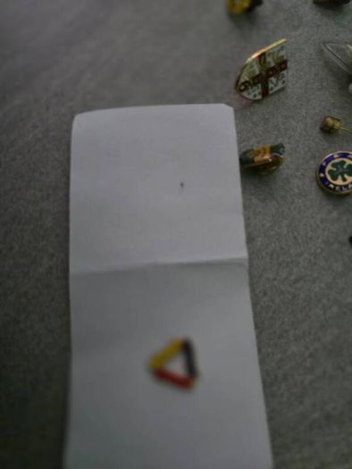 14 pins and 11 key rings from different football associations around the world