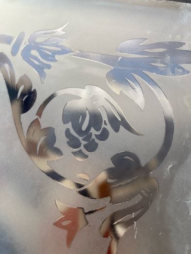 Acid etched glass panel