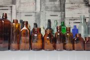 316 - Set of 9 Different Sizes Amber Glass Collectible Decorative Bottles and Jars