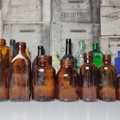 316 - Set of 9 Different Sizes Amber Glass Collectible Decorative Bottles and Jars