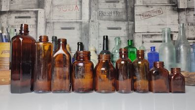 316 - Set of 9 Different Sizes Amber Glass Collectible Decorative Bottles and Jars