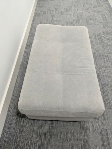 pouffe grey sitting