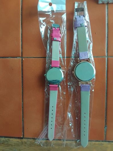 2 womans watches with leather straps