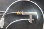 Bath tap with a shower head