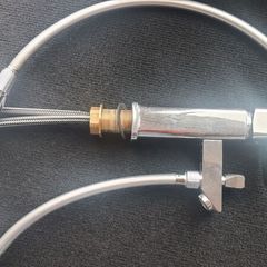 Bath tap with a shower head