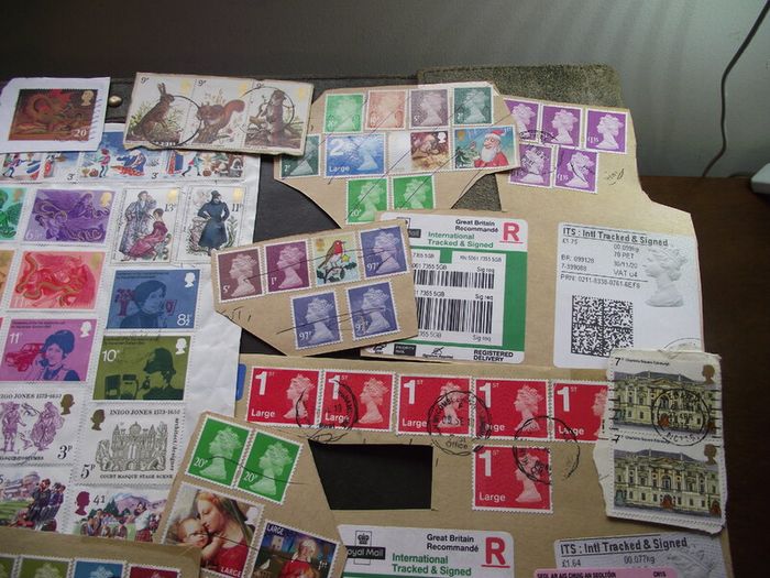 A box with collection of stamps from Great Britain