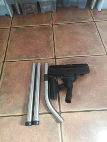Vacuum cleaner pipe and brush set.