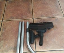 Vacuum cleaner pipe and brush set.