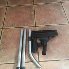 Vacuum cleaner pipe and brush set.