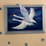 A commissioned painting of two swans with the wing of one swan overlapping the frame Image 3