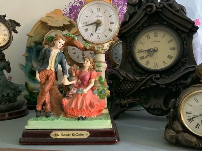 Clock, figures, Display Cabinet