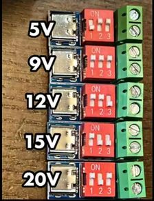 Input USB C voltage ranges from 4 V to 22 V. The output is 5V, 9V, 12V, 15V, 20V. Adjustable in increments using a combination of switches.