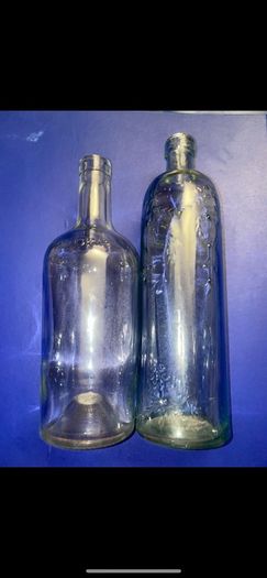 Jagermeister telling whiskey gin empty bottles