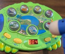 Carousel dinosaur reaction game