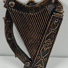 Small hard plastic harp