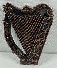 Small hard plastic harp