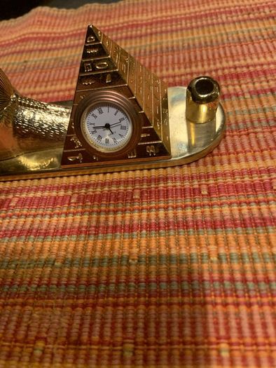 Pyramid pen holder and clock