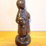 Boy Statue in a Home Dress with Bear Toy & Books. Image 2