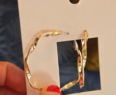 Gold earrings from H&M.