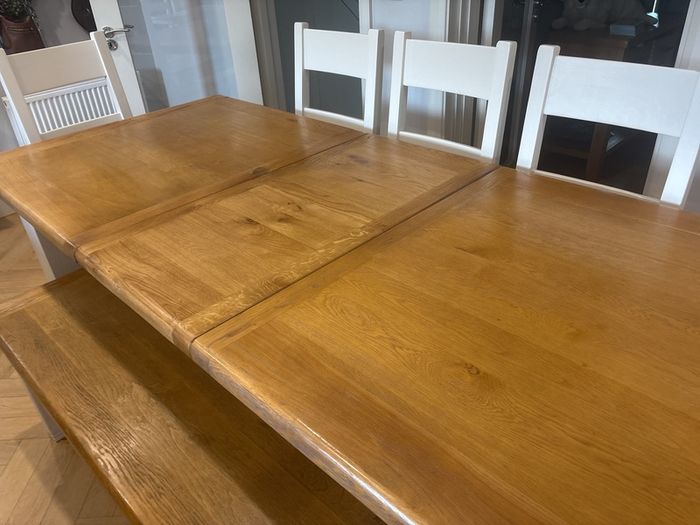 Large extendable 8 seater table with 5 chairs and a bench