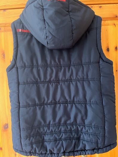 O'Neills CORK GAA Padded Puffer Gilet  jacket Navy. CORCAIGH. Detachable hood.  Size small adult. In Excellent condition