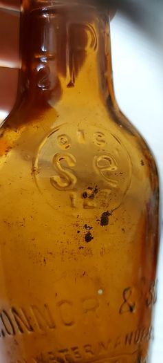 O Connor's kanturk 1/2 pint vintage bottle,,bottle seems to have a defect,around bottom of bottle, holds water no leeks,see pictures,sold as is ,lovely display advertising bottle, collectors items, buyer collects or pays postage thank you,