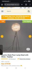 Silver lamp stand with feather shade